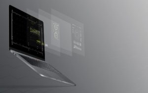 Laptop projecting several screens.