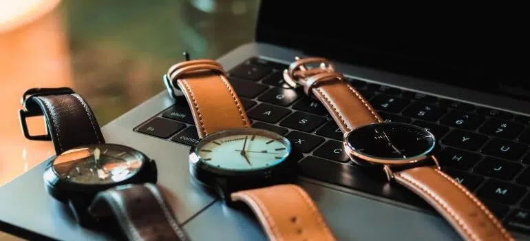 Wrist watches on laptop