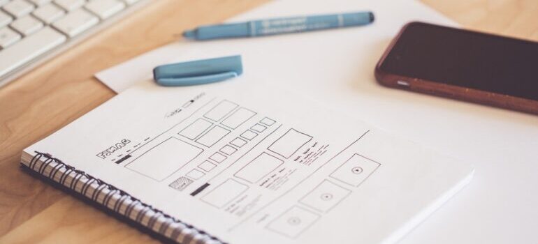 An image of sketches for a new website design in a notebook