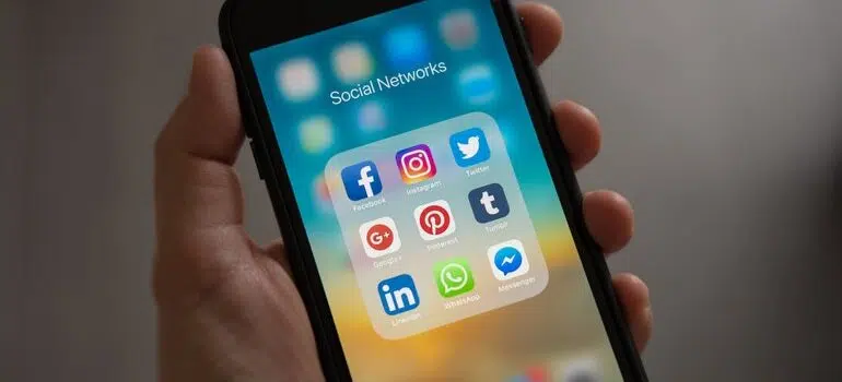 Phone screen showing social media apps.