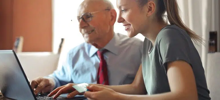 Young woman and an old man trying to create a customer-centric strategy
