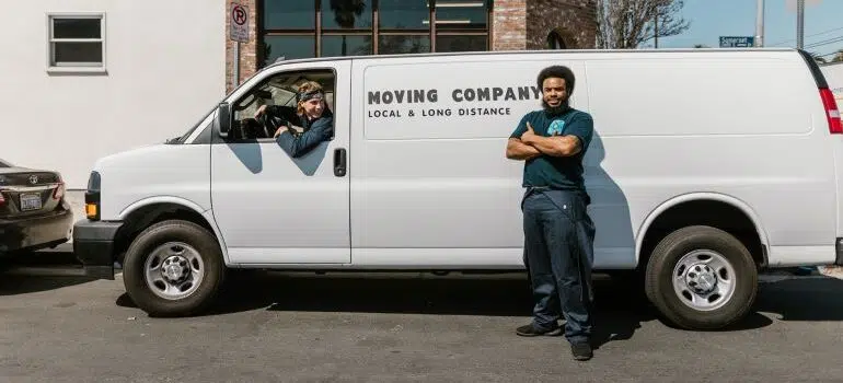 A two-man moving crew with a van.