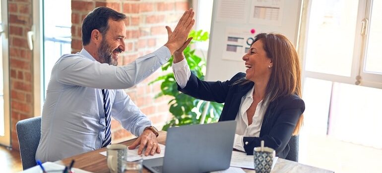 A high five with a business partner