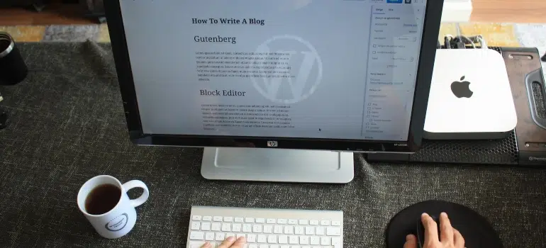 a man writing a blog on WordPress