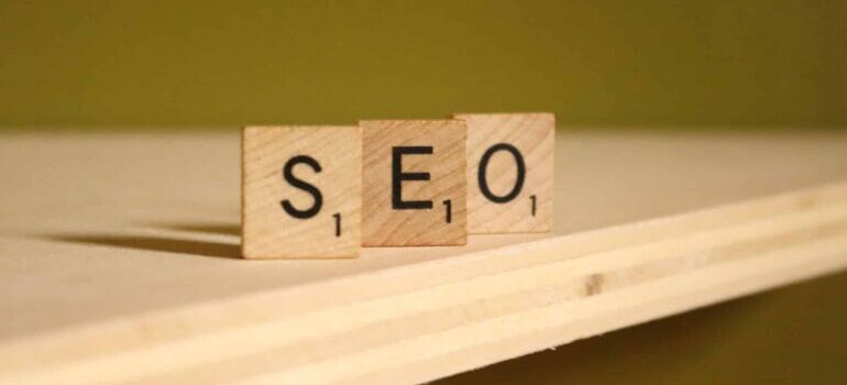 SEO is spelled with small wooden blocks.
