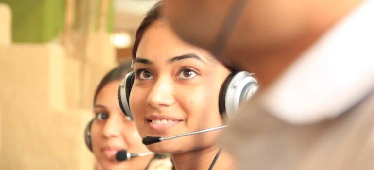 A smiling customer service representative.