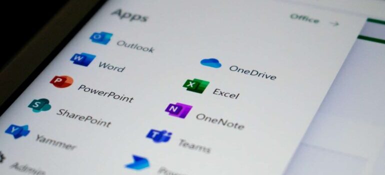 Microsoft Office applications are displayed on a screen.