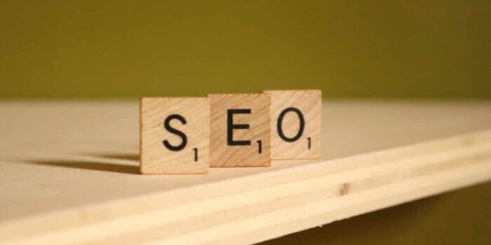 The words SEO spelled with wooden blocks.