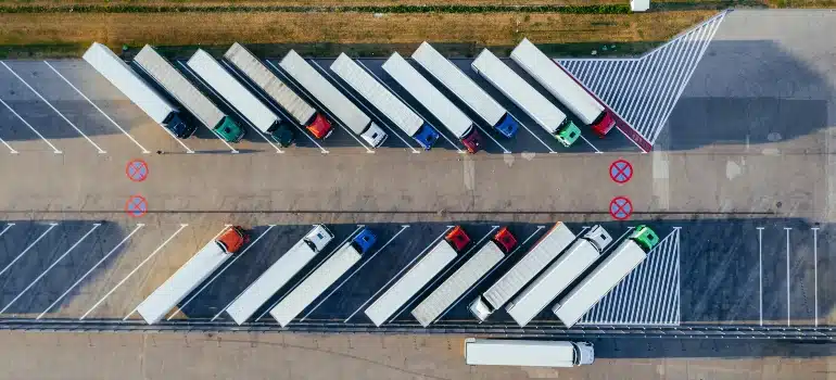 Moving trucks in a parking lot from above