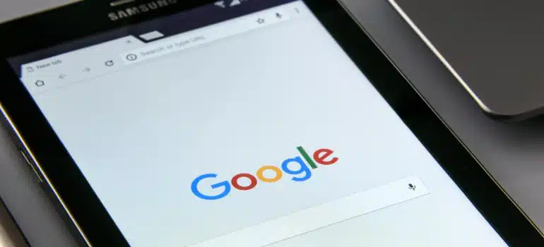 a tablet with google open