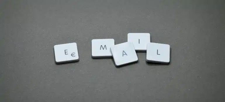 The word "email" on a grey surface. 