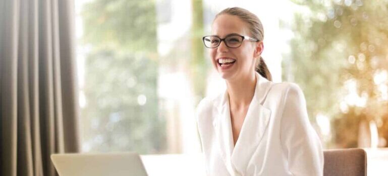 woman at her computer desk