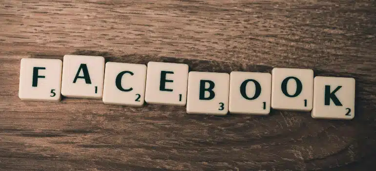 Scrabble tiles spelling "FACEBOOK"